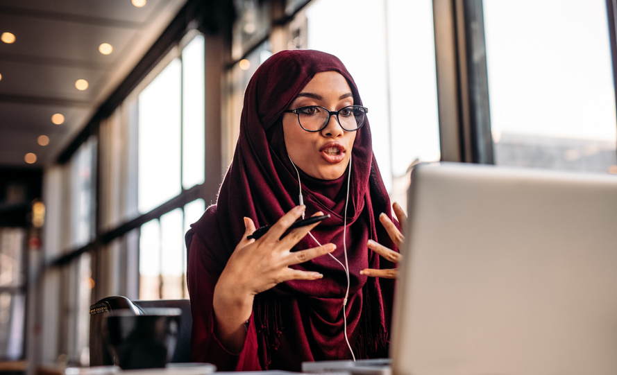 Businesswoman in Hijab Having a Video Chat on Laptop